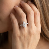 White gold Marquise Cut Diamond Ring with Baguette Side Stones, Channel Set Band, and Four-Prong Setting_59
