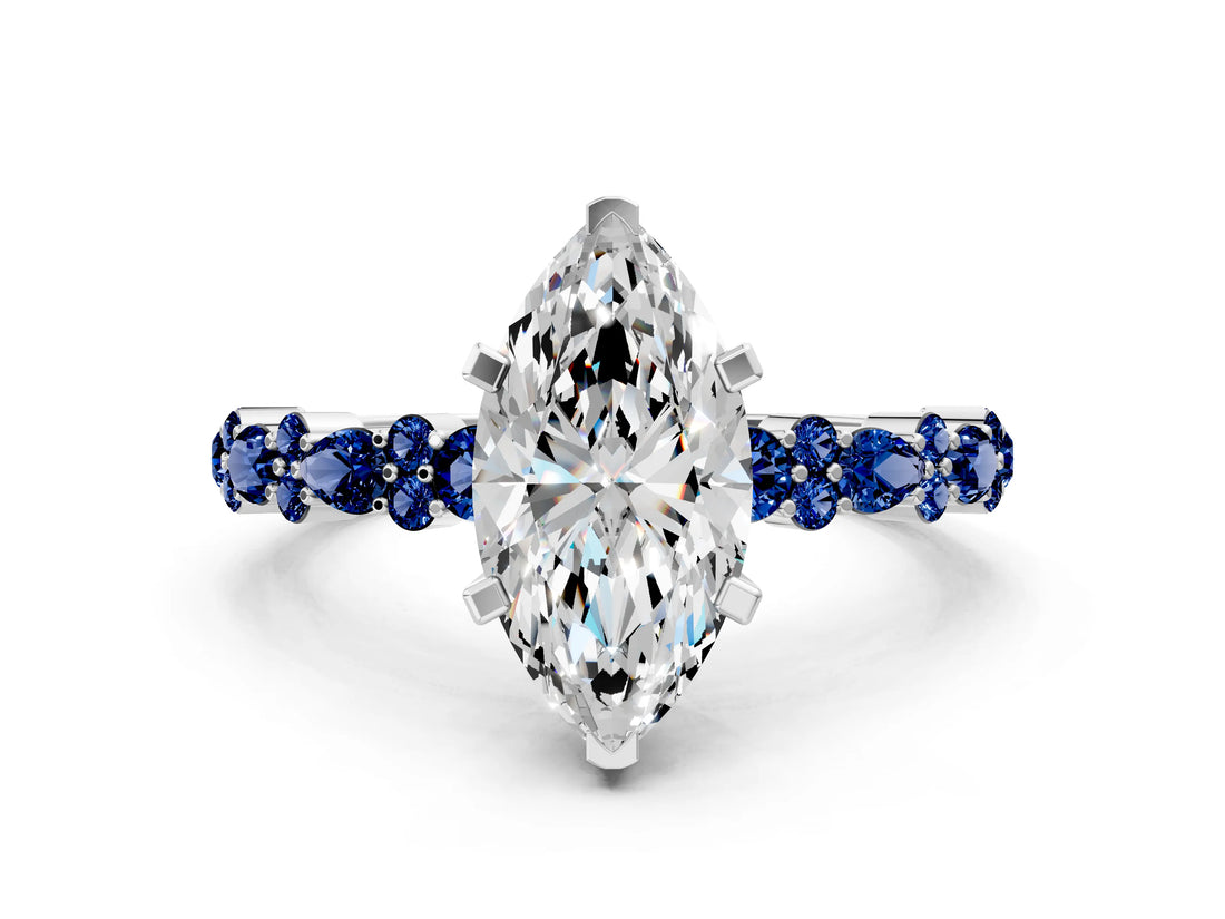 White gold Marquise Cut Diamond Side Stone Solitaire Ring with Round with Blue Sapphire side stone and Four-Prong Setting
