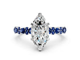 White gold Marquise Cut Diamond Side Stone Solitaire Ring with Round with Blue Sapphire side stone and Four-Prong Setting