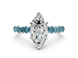 White gold Marquise Cut Diamond Side Stone Solitaire Ring with Round with Blue Topaz side stone and Four-Prong Setting