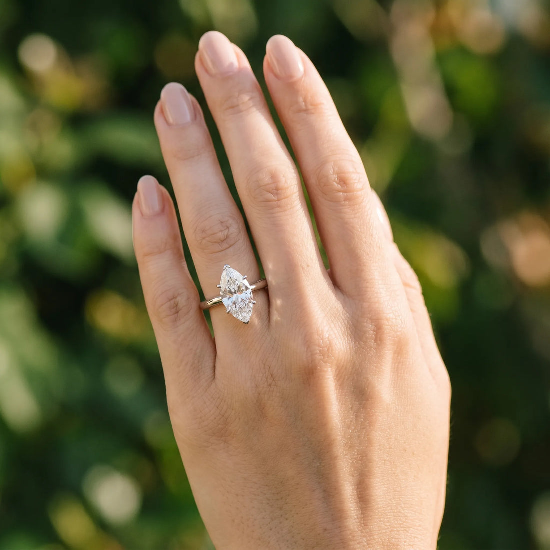 White gold Marquise Cut Diamond Solitaire Engagement Ring with Classic Band and Four-Prong Setting_182
