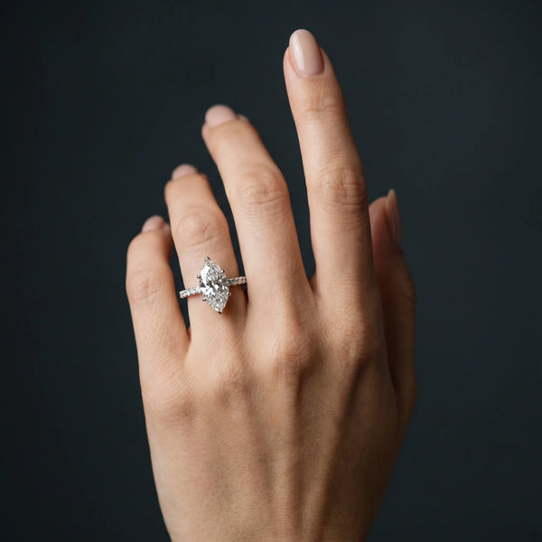White gold Marquise Cut Diamond Solitaire Engagement Ring with Round  Pavé Band and Prong Setting