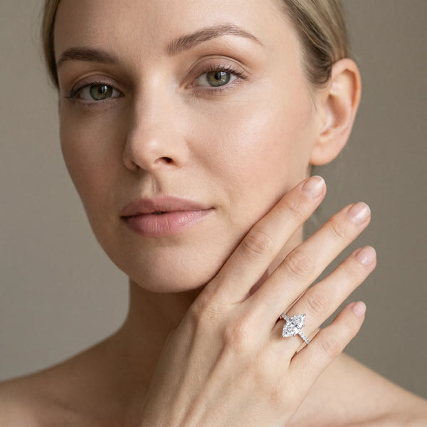 White gold Marquise Cut Diamond Solitaire Engagement Ring with Round  Pavé Band and Prong Setting
