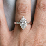 White gold Marquise Cut Diamond Solitaire Ring with Flower Prong Setting and Classic Band_339