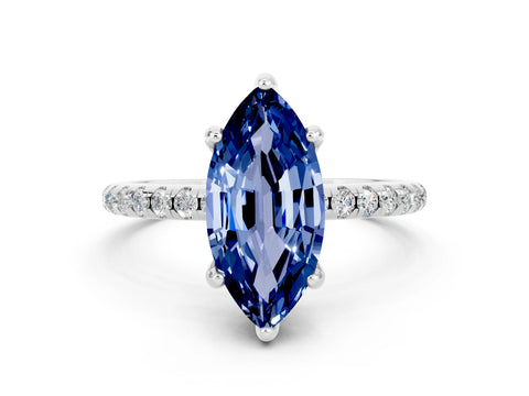 White gold Marquise Cut Diamond Solitaire Ring with Four-Prong Setting and Pavé Band