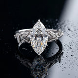 White gold Marquise Cut Diamond Solitaire Ring with Leaf Motif Band and Four-Prong Setting_85