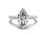 White gold Marquise Cut Diamond Solitaire Ring with Pavé Band and Prong Setting