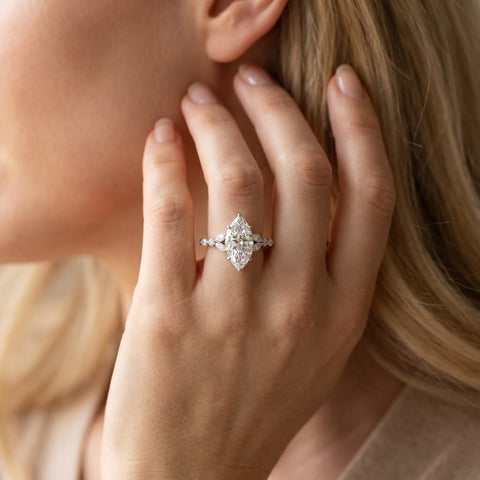 White gold Marquise Cut Diamond Solitaire Ring with Side Stones and Four-Prong Setting_114