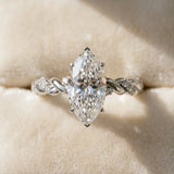White gold Marquise Cut Diamond Solitaire Ring with Twisted Band and Pavé Accents_67