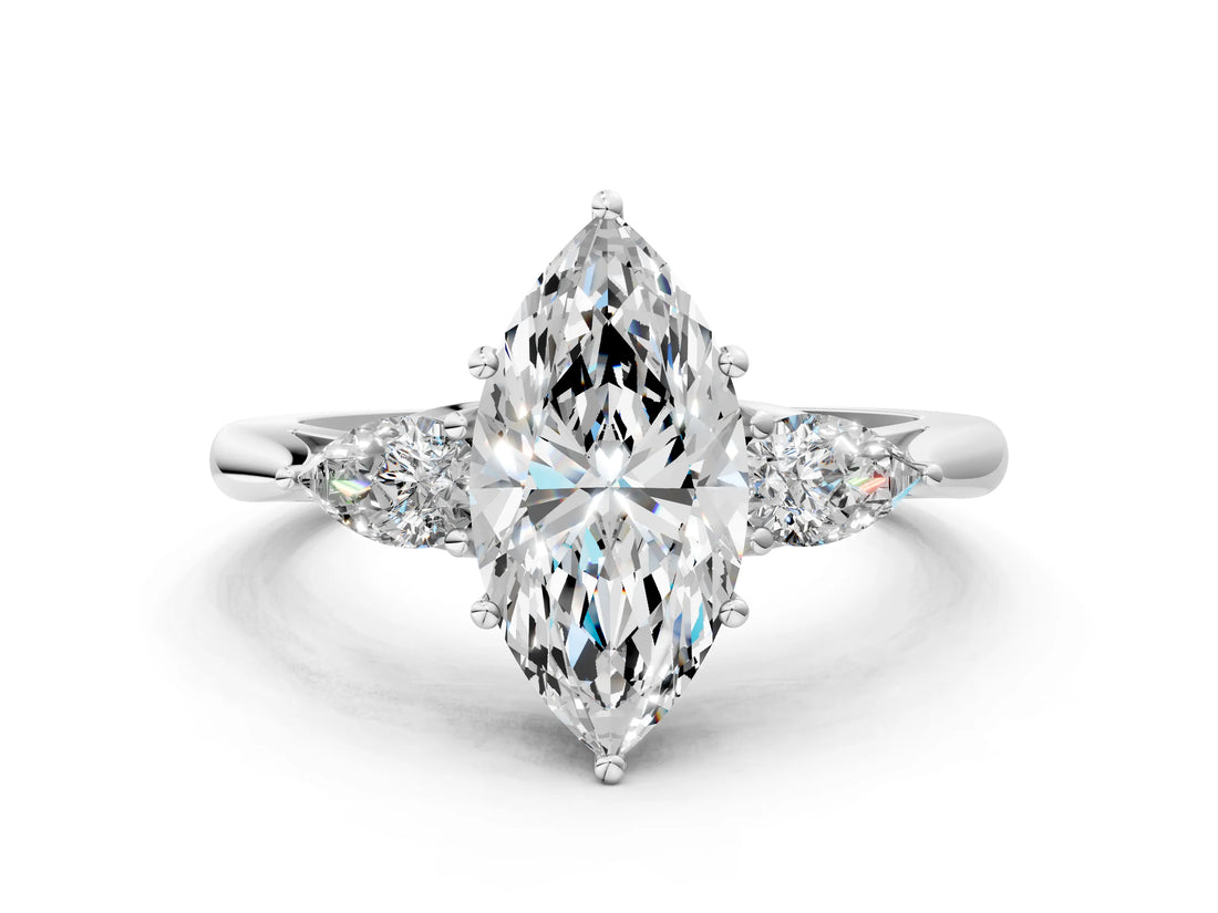 White gold Marquise Cut Diamond Three-Stone Ring with Pear Side Stones and Four-Prong Setting_76