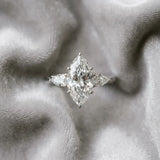 White gold Marquise Cut Diamond Three-Stone Ring with Pear  Side Stones and Prong Setting_91