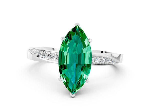 White gold Marquise Cut Emerald Engagement Ring with Side Stone Accents and Four-Prong Setting