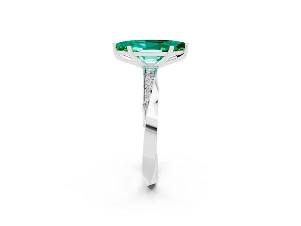 White gold Marquise Cut Emerald Engagement Ring with Side Stone Accents and Four-Prong Setting