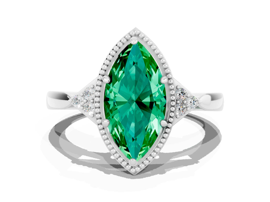 White gold Marquise Cut Emerald Halo Ring with Tapered Band and Four-Prong Setting