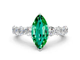 White gold Marquise Cut Emerald Prong Setting with Side Stones on a Pave Band