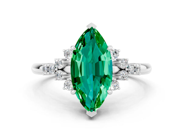 Platinum Marquise Cut Emerald Ring with Side Stones and Four-Prong Setting