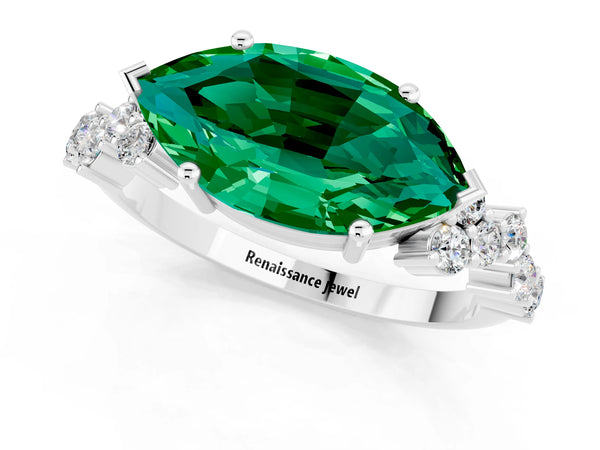 White gold Marquise Cut Emerald Scattered Round Accent Ring with Prong Setting