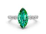 White gold Marquise Cut Emerald Side Stone Solitaire Ring with Round  and Four-Prong Setting_48