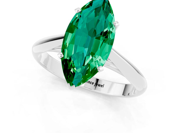Silver Marquise Cut Emerald Solitaire Engagement Ring with Cathedral Setting and Four-Prong Mount