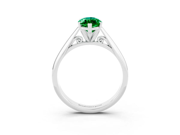 White gold Marquise Cut Emerald Solitaire Engagement Ring with Cathedral Setting and Four-Prong Mount