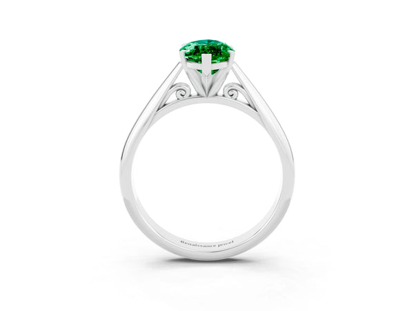 White gold Marquise Cut Emerald Solitaire Engagement Ring with Cathedral Setting and Four-Prong Mount