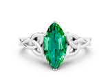 White gold Marquise Cut Emerald Solitaire Engagement Ring with Celtic Knot Band and Four-Prong Setting