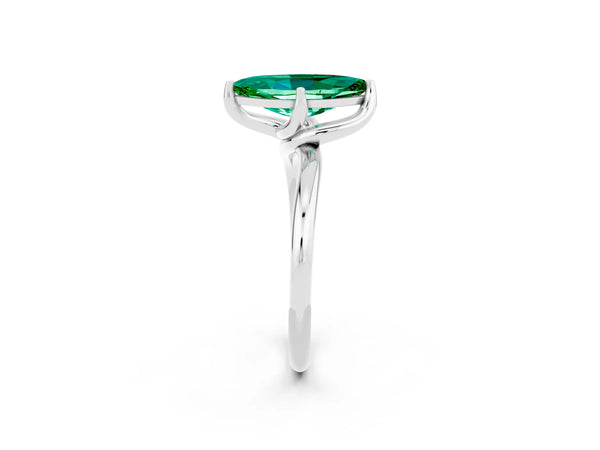 Platinum Marquise Cut Emerald Solitaire Engagement Ring with Four-Prong Setting and Classic Band