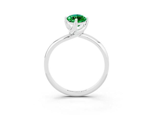 White gold Marquise Cut Emerald Solitaire Engagement Ring with Four-Prong Setting and Classic Band