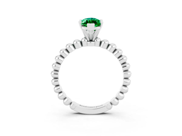 Platinum Marquise Cut Emerald Solitaire Ring with Beaded Band and Prong Setting