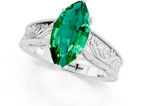 White gold Marquise Cut Emerald Solitaire Ring with Engraved Band and Four-Prong Setting_1