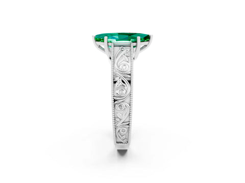 White gold Marquise Cut Emerald Solitaire Ring with Engraved Band and Four-Prong Setting_2