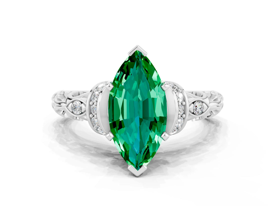 White gold Marquise Cut Emerald Solitaire Ring with Filigree Band and Four-Prong Setting_24
