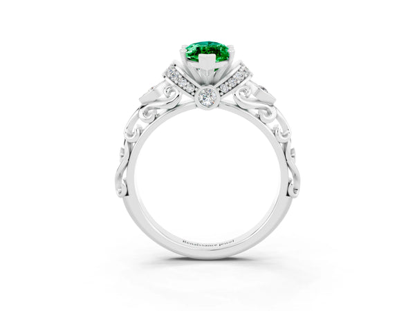 Platinum Marquise Cut Emerald Solitaire Ring with Filigree Band and Four-Prong Setting
