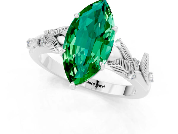 Platinum Marquise Cut Emerald Solitaire Ring with Leaf Motif Band and Four-Prong Setting