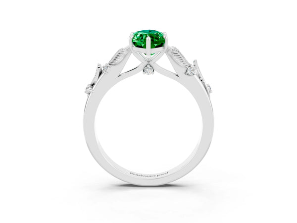 White gold Marquise Cut Emerald Solitaire Ring with Leaf Motif Band and Four-Prong Setting