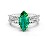 White gold Marquise Cut Emerald Solitaire Ring with Pavé and Channel Set Band