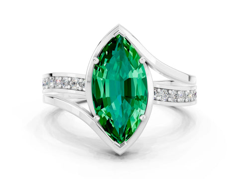 White gold Marquise Cut Emerald Solitaire Ring with Split Shank and Prong Setting
