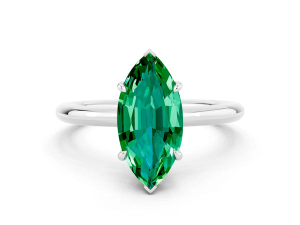 Silver Marquise Cut Emerald Solitaire Ring with Thin Band and Four-Prong Setting