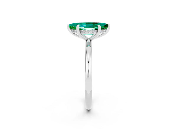 Platinum Marquise Cut Emerald Solitaire Ring with Thin Band and Four-Prong Setting