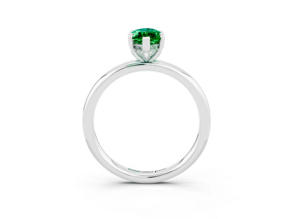 White gold Marquise Cut Emerald Solitaire Ring with Thin Band and Four-Prong Setting