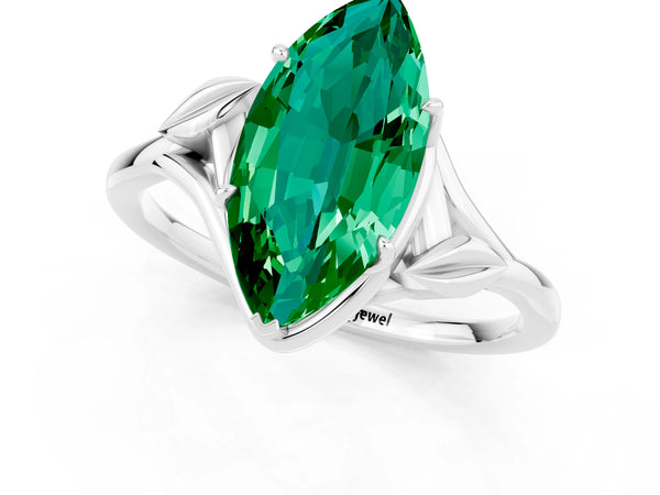 Silver Marquise Cut Emerald Solitaire Ring with Twist Band and Four-Prong Setting