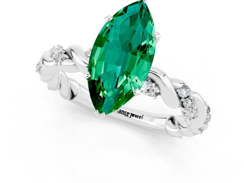 White gold Marquise Cut Emerald Solitaire Ring with Twisted Band and Pavé Accents_1