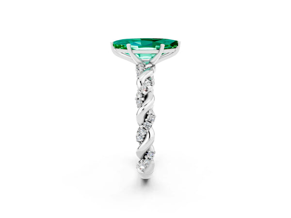 White gold Marquise Cut Emerald Solitaire Ring with Twisted Band and Pavé Accents