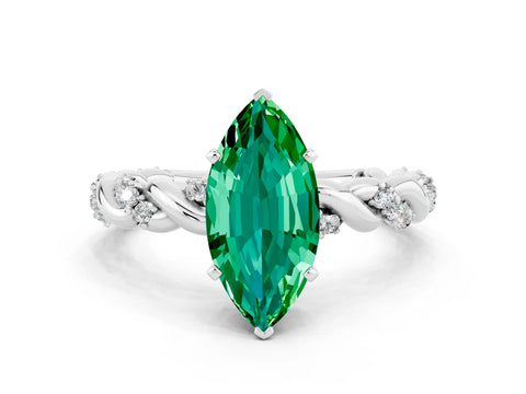 White gold Marquise Cut Emerald Solitaire Ring with Twisted Band and Pavé Accents