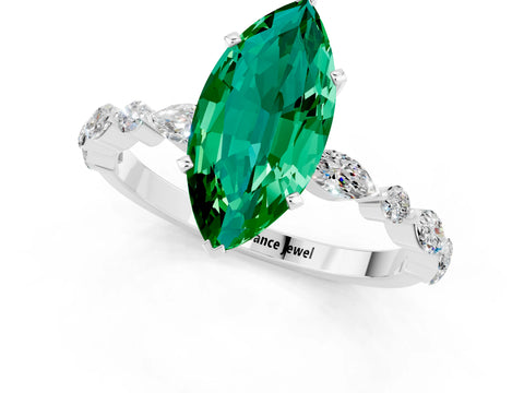 White gold Marquise Cut Emerald Solitaire with Side Stones on a Pavé Band and Four-Prong Setting_1