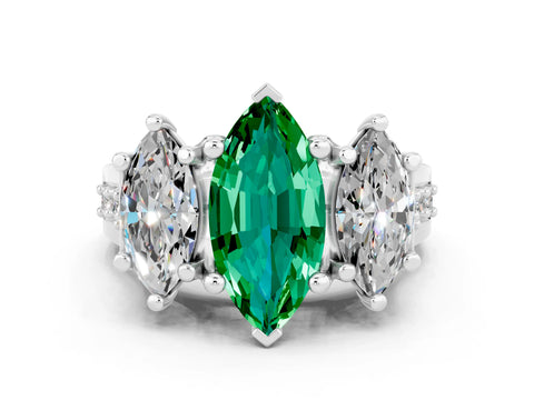 White gold Marquise Cut Emerald Three-Stone Ring with Channel Set Band and Four-Prong Setting