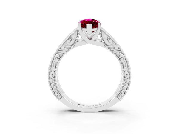 White gold Marquise Cut Garnet Solitaire Ring with Engraved Band and Four-Prong Setting