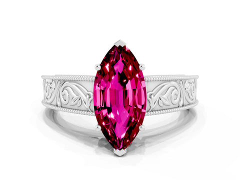 White gold Marquise Cut Garnet Solitaire Ring with Engraved Band and Four-Prong Setting