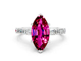 White gold Marquise Cut Garnet Solitaire with Side Baguettes and Channel Set Band