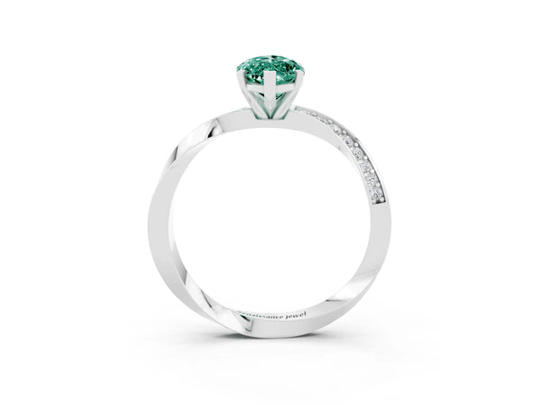 Platinum Marquise Cut Green Sapphire Engagement Ring with Side Stone Accents and Four-Prong Setting